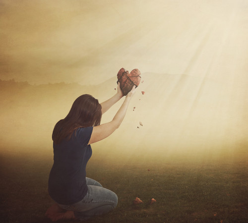 A Woman With A Broken Heart In Field.