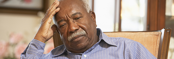 Senior man relaxing in armchair