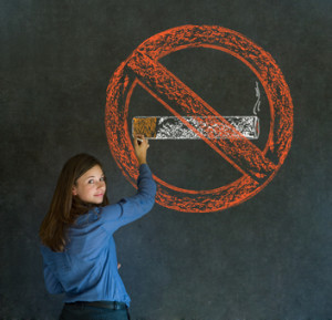 No smoking tobacco woman on blackboard background