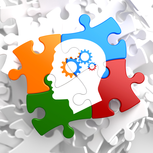 Psychological Concept - Profile of Head with Cogwheel Gear Mechanism Located on Multicolor Puzzle.