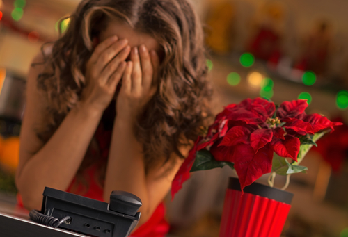 Christmas Can Be A Stressful Holiday. Frustrated Woman Waiting For A Phone Call.